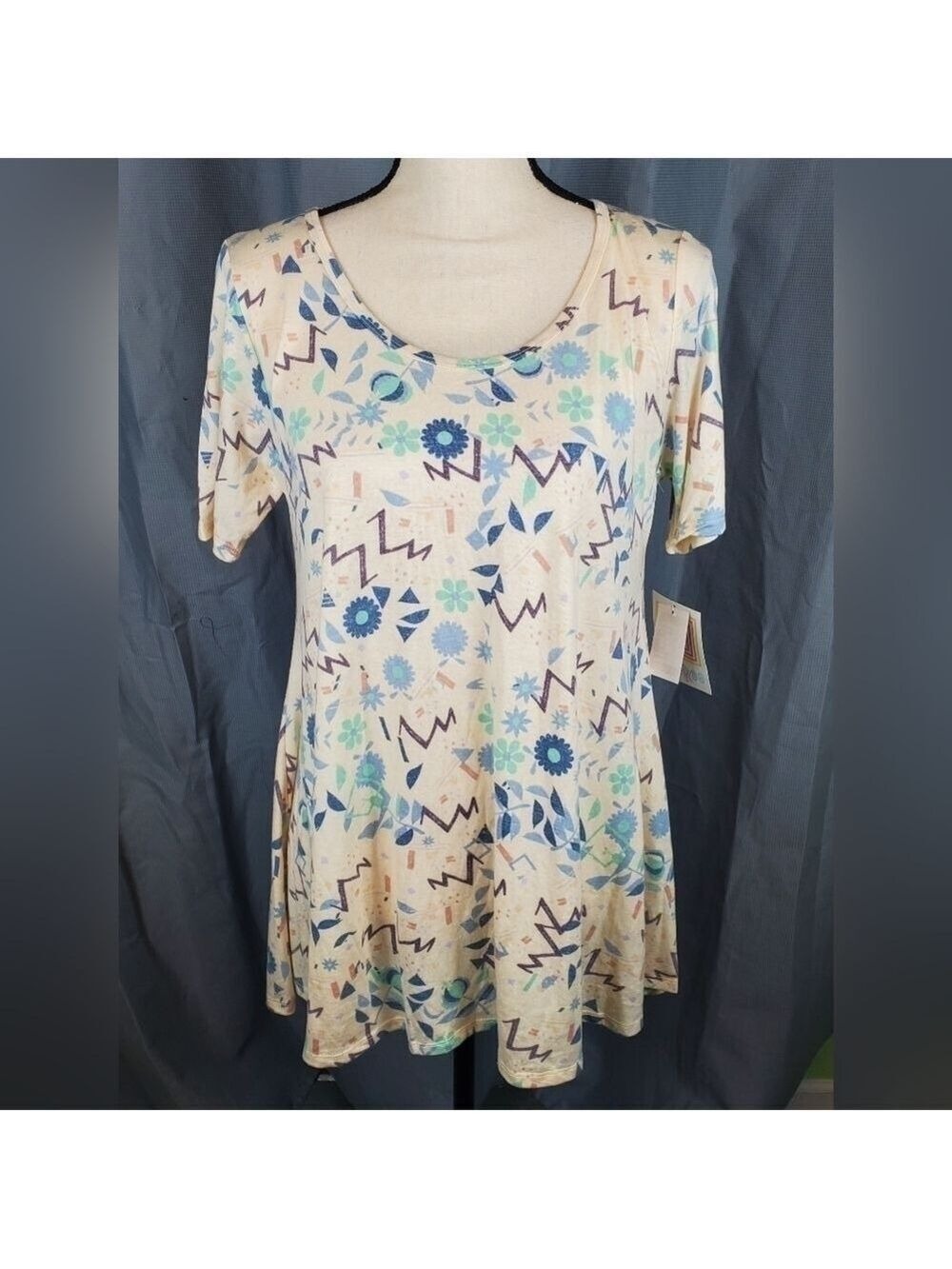 NWT Lularoe Perfect T, cream with multicolored geometric pattern, size XS